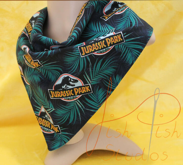 A Jurassic park themed bandana. Extra large in size for fursuit acessories or everyday fashion wear