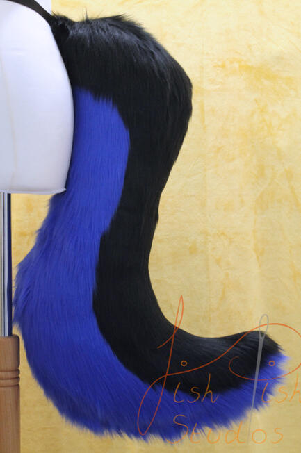 large black and blue wolf tail for fursuiting. it can be worn on a belt or sewn onto a suit. Handmade by fishpish studios