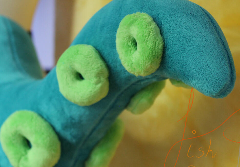 A unique style of tail, this one sports a solid colour base with different coloured suckers. Different colour combinations are available via the store, but more complex version will need commissioning. Handmade in the UK by fishpish studios