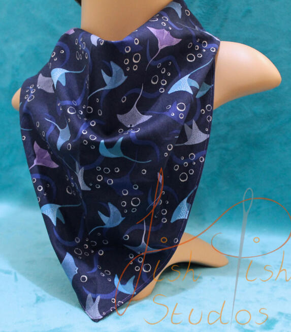 an XL bandana with a manta ray print. The fabrics are polycotton. The design is XL at 36 inches, making it a great fashion accessory or something to decorate your fursuit. handmade in the UK by fishpish studios