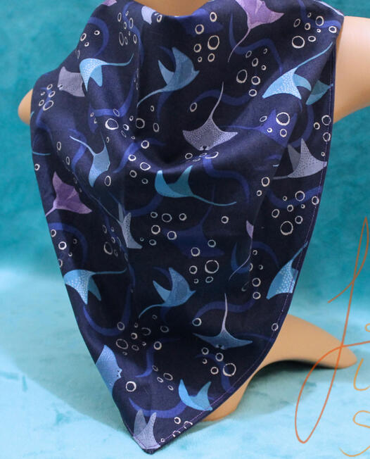 Sealife bandana a deep blue watery bandana with mantarays and bubbles on it. it handmade and larger than usual for fursuiters and fashion statements