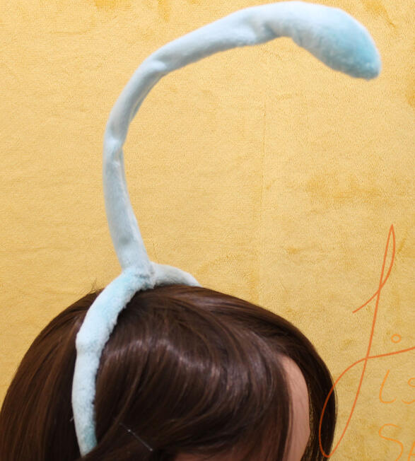 Customised Single Antenna Created for a commission, this single antenna is for an alien costume. Balanced on a plastic headband, this wire-cored, soft plush antenna can be posed as needed. handmade in the UK by fishpish studios