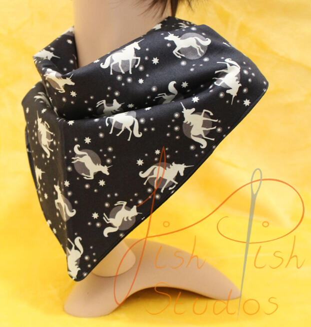 Glowing Unicorns an XL bandana with little glowing unicorn on a black background. The fabrics are polycotton. The design is XL at 36 inches, making it a great fashion accessory or something to decorate your fursuit. handmade in the UK by fishpish studios